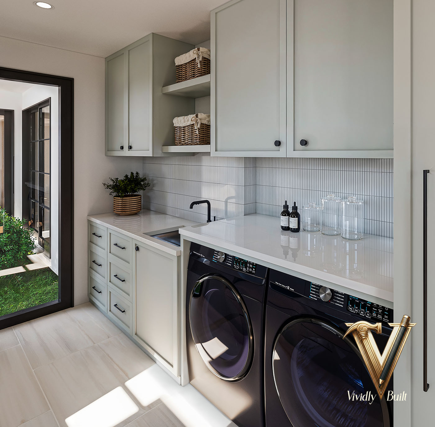 Laundry room with sage cabinetry, quartz counters, ribbed-tile backsplash and side-by-side machines — Pacific Palisades fire rebuild