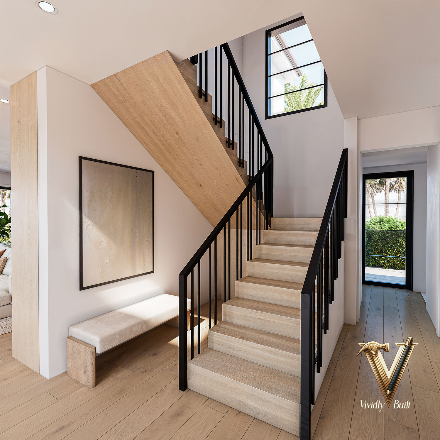 Entry stair with oak treads, a black steel rail and a full-height window bringing light down the run — Pacific Palisades fire rebuild